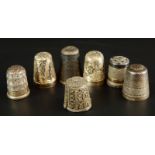 A collection of white metal and other thimbles, various societies and designs.