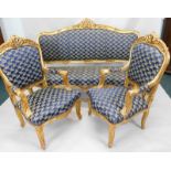 A Continental gilt three piece salon suite, the moulded frame carved with scrolls etc.,