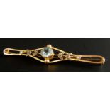 A 9ct gold bar brooch, set with aquamarine and seed pearl, 3.7g all in.