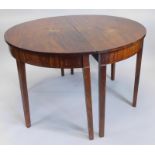 An early 19thC mahogany D-end dining table, on square tapering legs, lacking leaf, 120cm dia.