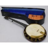 A Savans maple and ebonised five string banjo, with mother of pearl inlay, 90cm long, in a fitted