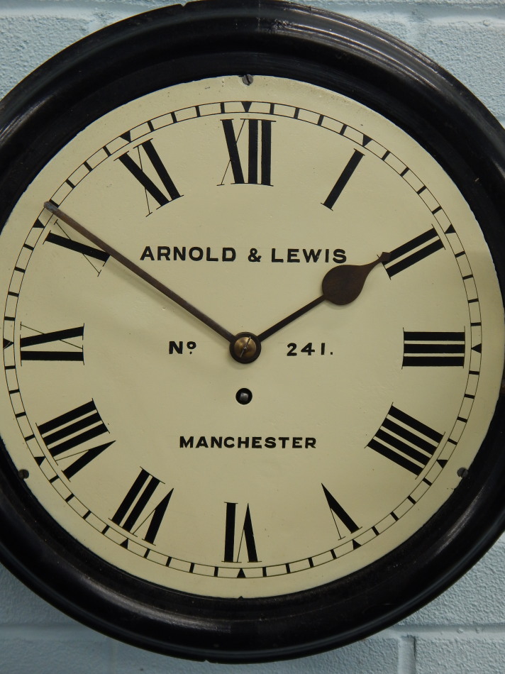 A late 19thC ebonised railway wall clock, the dial signed Arnold & Lewis, Manchester, number 241, - Image 2 of 3