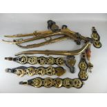 A quantity of horse brasses, brass hames and other attachments