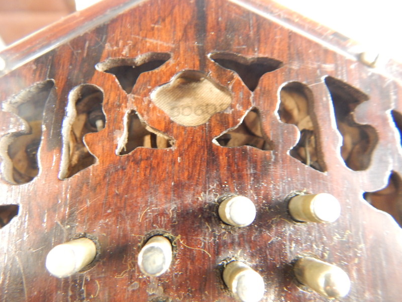 A 19thC rosewood concertina or squeeze box, with twenty four buttons or keys to each end, no visible - Image 4 of 4