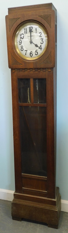 An Art Deco style oak longcase clock, with silvered dial, 180cm high.