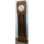 An Art Deco style oak longcase clock, with silvered dial, 180cm high.