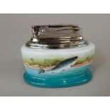 A Minton porcelain and silver plated lighter, decorated with a leaping salmon within a Scottish