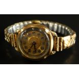 A ladies wristwatch, with circular watch head, on gold plated expanding bracelet.