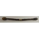 An African horn and metal cosh, 36cm long.