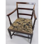 A 19thC mahogany open armchair, with a rail back and drop in seat on square tapering legs. (AF)