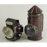 A Lucas and Sons King of The Road cycling lamp, and another bronzed metal lamp.
