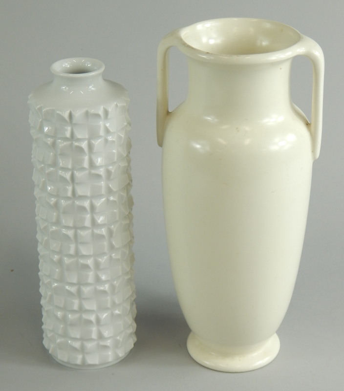 Two items of art pottery, a Fulham two handled vase and a Meissen vase with crossed swords.