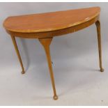 A mahogany and beech demi-lune side table, on cabriole legs with pad feet, 104cm wide