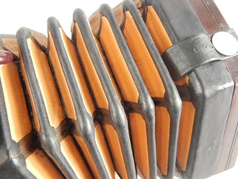 A 19thC rosewood concertina or squeeze box, with twenty four buttons or keys to each end, no visible - Image 3 of 4