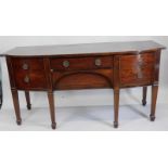 A 19thC mahogany and burr yew bow fronted sideboard, with an arrangement of drawers, and a single