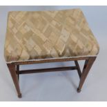 An Edwardian and mahogany satinwood crossbanded stool, with a padded seat, square tapering legs