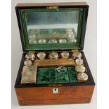 A late 19thC burr walnut travelling box, of rectangular outline with (plain) shield shaped mother of