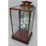 A small late 19th/early 20thC mahogany tabletop tobacco cabinet, stamped M T Co, with bevelled