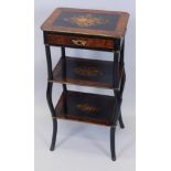 A French amboyna and ebonised three tier etagere, with floral marquetry panels and a frieze drawer