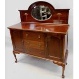 An early 20thC mahogany sideboard, the raised back inset with a central oval mirror plate, the