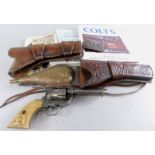 Various items of Wild West Interest, to include a replica gun, a brass hip flask stamped US, leather