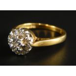 An 18ct gold dress ring, set with tiny illusion set diamonds, 3.7g all in.