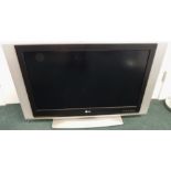 A silver LG LCD 37" television.