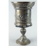 A Victorian silver horse racing trophy, the tapering border cast with patera, above a gadrooned band