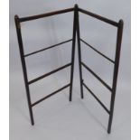 A 19thC two section towel rail, with channelled divisions and square section finials.