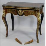 A 19thC Boulle fold over card table, ebonised with brass and tortoiseshell veneers having a