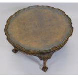 A burr walnut coffee table, the quarter veneered top with a pie crust border on cabriole legs with