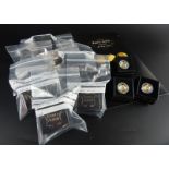 A 2009 Fabula Aurum gold coin collection, comprising 12 0.5g 24ct gold coins, in original