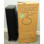 A pair of Mission Three hi-fi speakers.