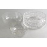 Two graduated star cut bowls, and a cut glass fruit bowl, 22cm dia. (3)