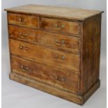 A Victorian oak chest, of two short and three long drawers, on a plinth base, 107cm wide.