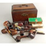 A 19thC mahogany tea caddy, and various pipes, etc.