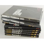 Various Formula 1 year books, to include 2003, 2002, etc., presented at The Auto Sports Awards 2003,