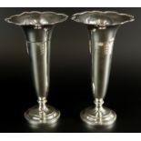 A pair of George V silver trumpet shaped vases, each with a tapering base, Birmingham 1919, possibly