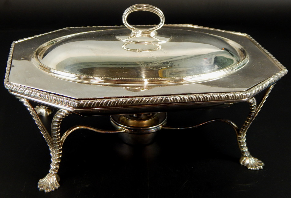 A silver plated canted rectangular warming entree dish and cover, with a reeded handle, the base