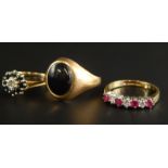 Three 9ct gold dress rings, to include a stone set floral cluster, a half hoop eternity, and an