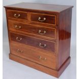 A late Victorian mahogany and satinwood crossbanded chest of drawers, the top with a moulded edge