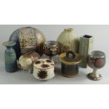 A quantity of studio pottery, to include a Grunfeld preserve jar and cover, a Surrey ceramic pig,