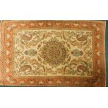 A Persian silk type rug, decorated with central medallion surrounded by Botei birds, scrolls,