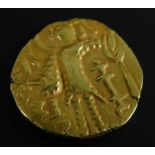 A Kashmiri gold Indian dinar, Kushan Empire, possibly 4th century, figure standing holding a