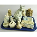 Various items of Khan pottery, to include two cats, a shell shaped vase, etc.