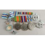 A quantity of medals, to include Royal Observer Core medal, various badges, etc.