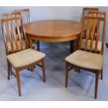 A walnut and burr walnut extending dining table, with two 'D' shaped ends and central leaf, on