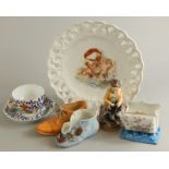 A collection of Continental ceramics, to include a German porcelain figure of a young man feeding