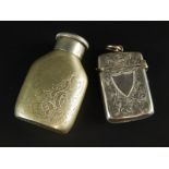 A late Victorian silver vesta case, engraved with scrolls, etc., Birmingham 1894, and a silver