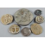 A collection of Greek white metal coins, to include a silver Drachm, cast with the Gorgonian head,